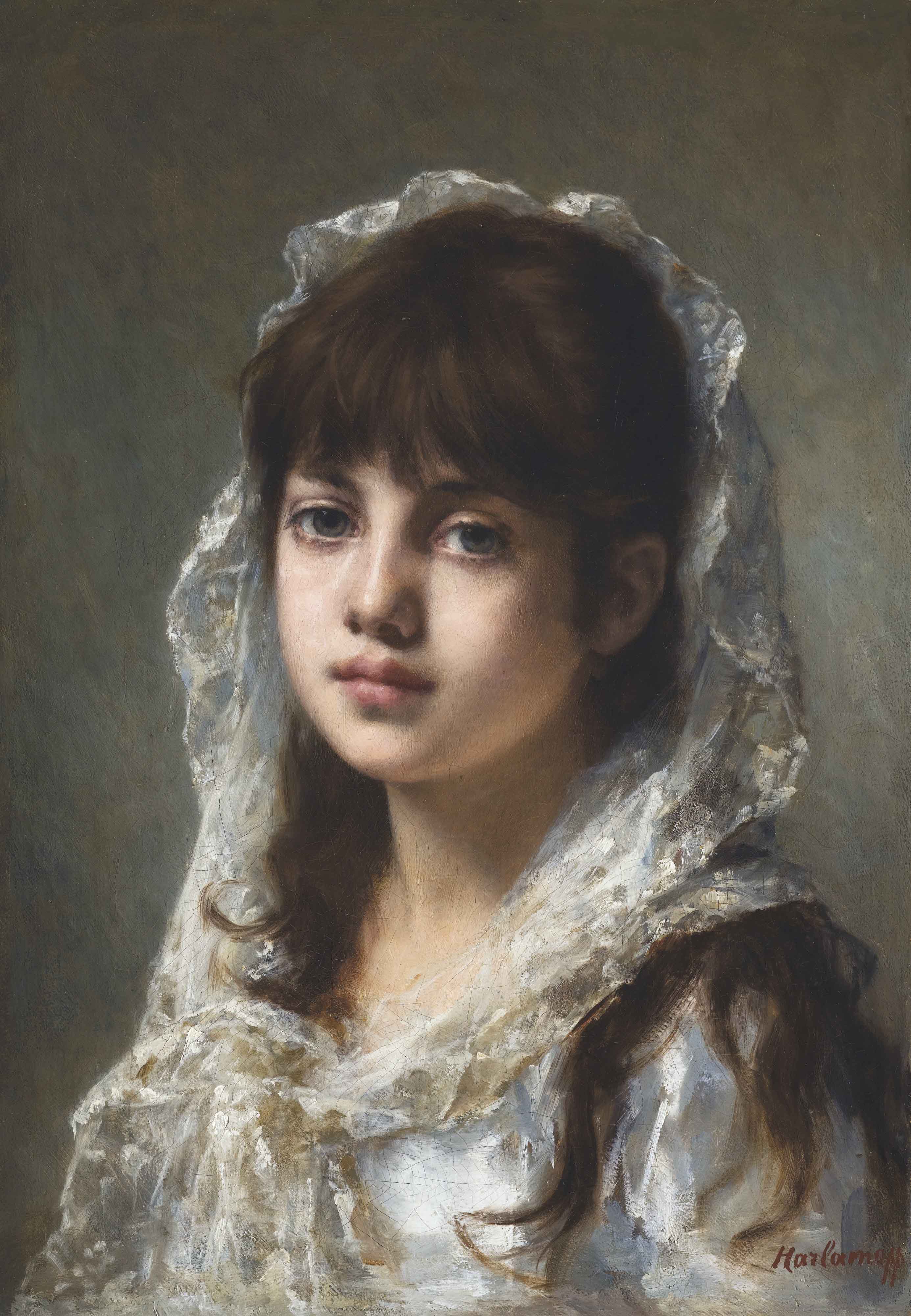 Portrait of ayoung girl wearing a white veil